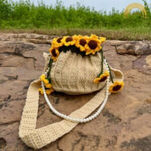 crochet sunflower potli with pearl hanging beige